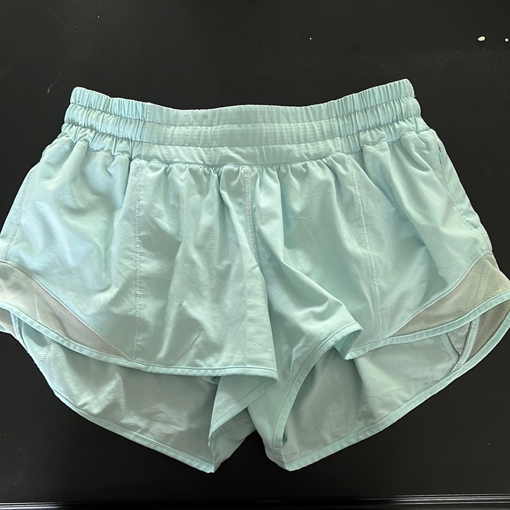 Barely worn, women’s lululemon running short in the color light blue